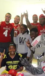 Pack players and Mr. Wuf stopped by WakeMed Children's Hospital.