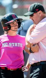 Head coach Shawn Rychcik talks with freshman Lana Van Dyken