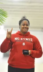 Nicole Chavis set a new school record in the women's weight throw on Friday with a fifth round heave of 68' 8.75
