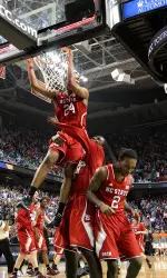 T.J. Warren and the Wolfpack celebrate after beating 11th-ranked Syracuse.
