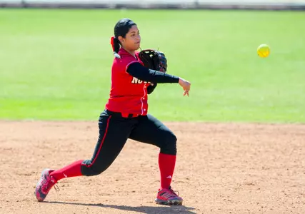 Freshman Alyssa Compton throws the batter out at first base (Photo credit Greg Mintel)