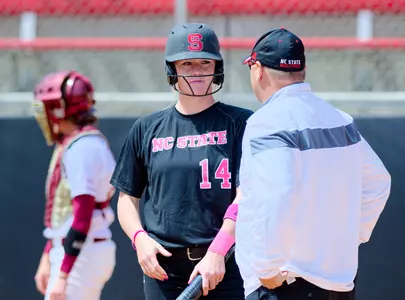 Head Coach Shawn Rychcik has a word with freshman Meredith Burroughs (Photo Credit: Greg Mintel)