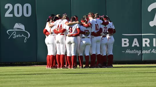 SB team huddle prior to FSU Game 2 3/29/24