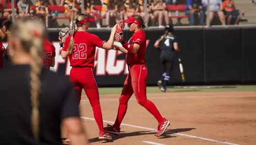 Tori Ensley and Rylee Wyman between innings in game three vs #5 Duke