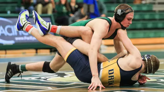 Bernie Truax competes against a wrestler from Drexel.