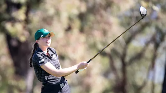 Jensen Jalufka tees off in recent golf tournament.