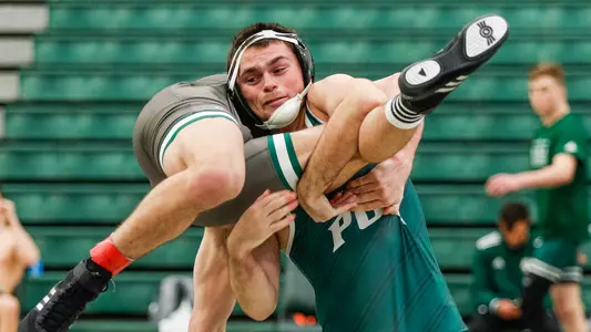 Nathan Tausch works for a takedown.