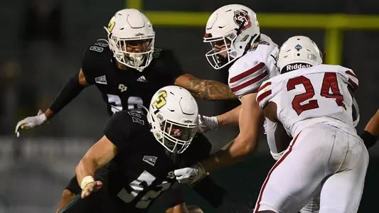 Fenton Will tries to make a tackle.