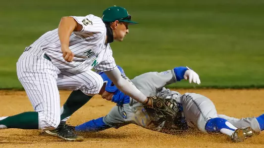Brooks Lee tags out a UCLA runner.