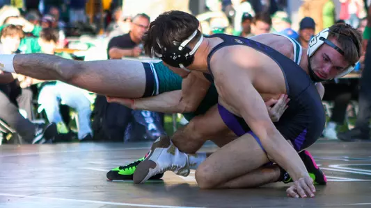 Brawley Lamer wrestles against San Francisco State.