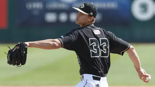 Drew Thorpe throws a pitch.