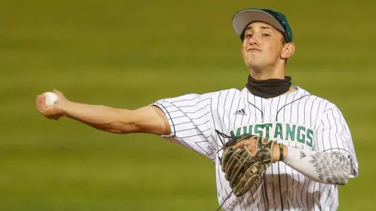 Brooks Lee throws out a runner.