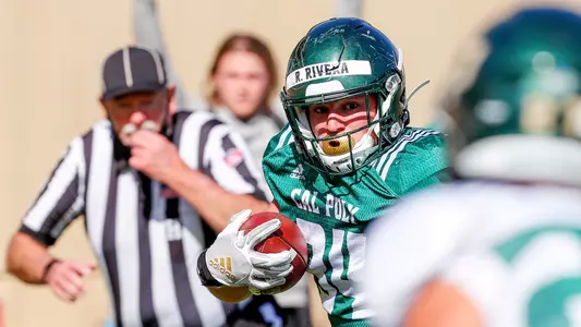 Ryan Rivera heads downfield after making a catch.