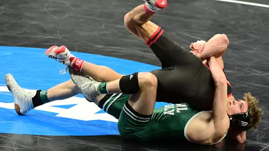 Bernie Truax tries to pin his foe.