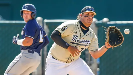 Joe Yorke catches throw too late to get UC San Diego baserunner.