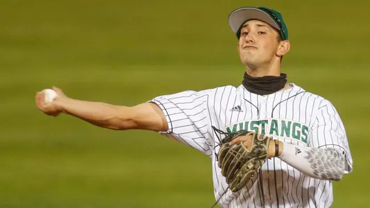 Brooks Lee throws out a runner.