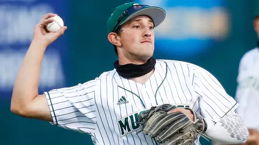 Brooks Lee makess the throw to first base.