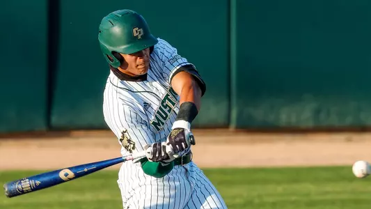 Taison Corio swings at a pitch.