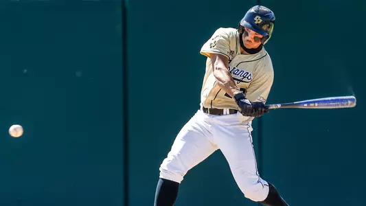 Brooks Lee swinging at a pitch.
