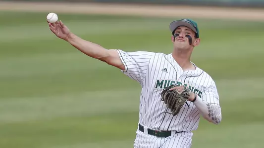 Brooks Lee throws out a runner.