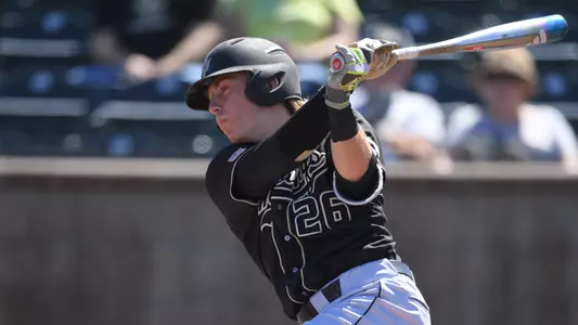 Nick Meyer takes a swing.