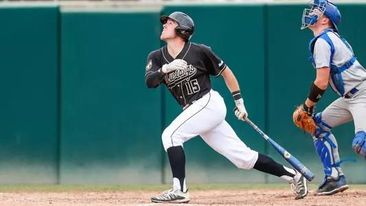 Reagan Doss watches his fly ball.