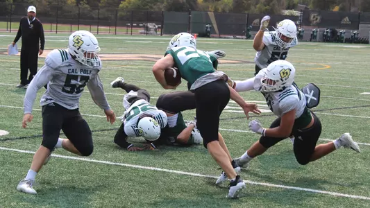 Logan Ast runs for yardage.