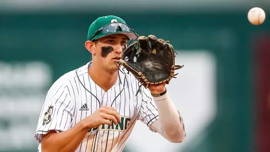 Brooks Lee fields a grounder at shortstop.