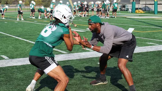 Nick Edwards instructs a player.