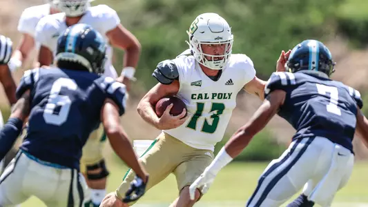 Spencer Brasch scrambles for yardage.