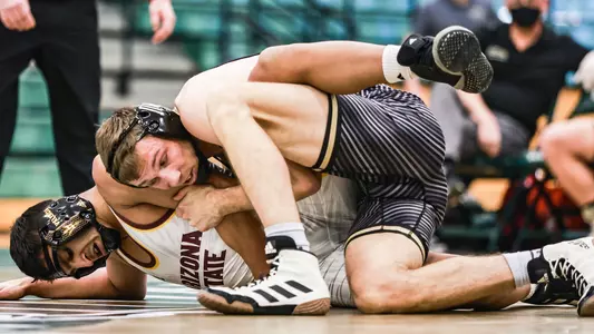 Evan Wick won by a major decision in Cal Poly home debut.