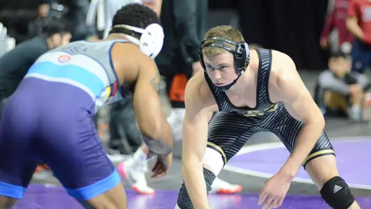Bernie Truax faces off against Mark Hall of Penn RTC.