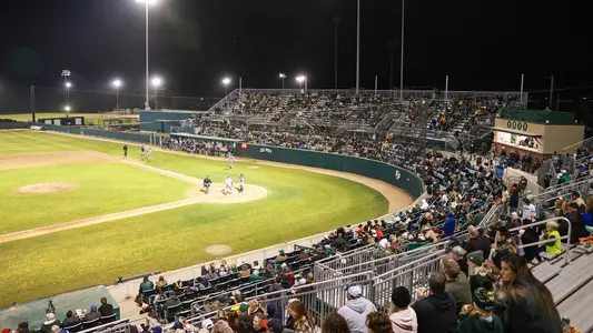 Crowd files in for Cal Poly baseball game.