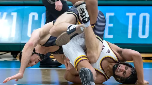 Evan Wicks wrestles in Arizona State dual.