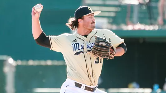 Zach Button pitches for Cal Poly
