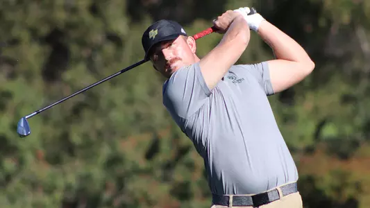 Will Draper sends a tee shot down the fairway.