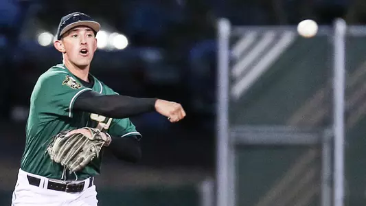 Brooks Lee throws out a runner.