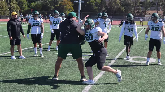 Linebackers  during a drill in practice.