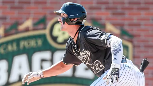 Brooks Lee follows flight of his hit to right field.
