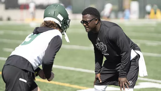LaTef Grim coaches his players.