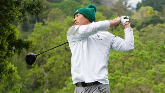 Baron Szeto sends a shot down the fairway.