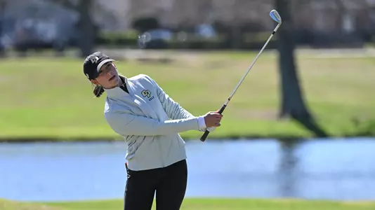 Nicole Neale executes a shot out of the sand trap during opening round of Tulane Classic on Sunday. Neale is tied for 16th place entering Tuesday's final round.