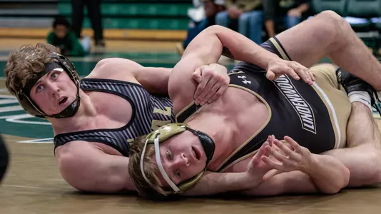 Bernie Truax works for a fall against Lindenwood in December.