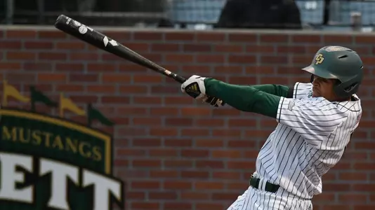 Taison Corio swings at a pitch.