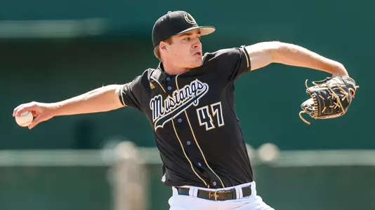 Ryan Baum throws a pitch.