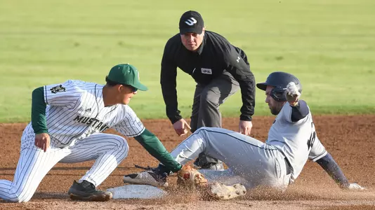 Taison Corio applies the tag a tad late.