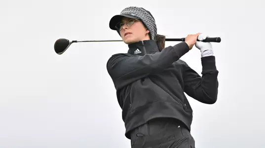 Nicole Neale follows her drive at NCAA Pullman Regional.