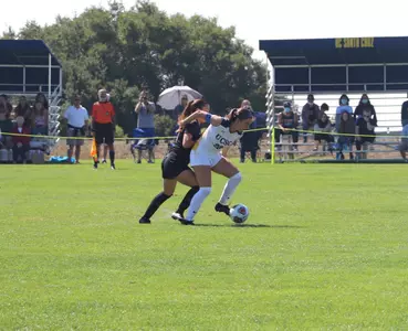 Celine Ertekin protects the ball