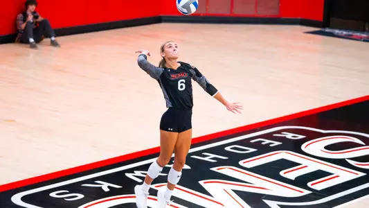 Ellie Burns serves