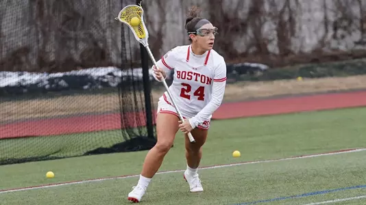 Ava Barry behind the cage looking to pass